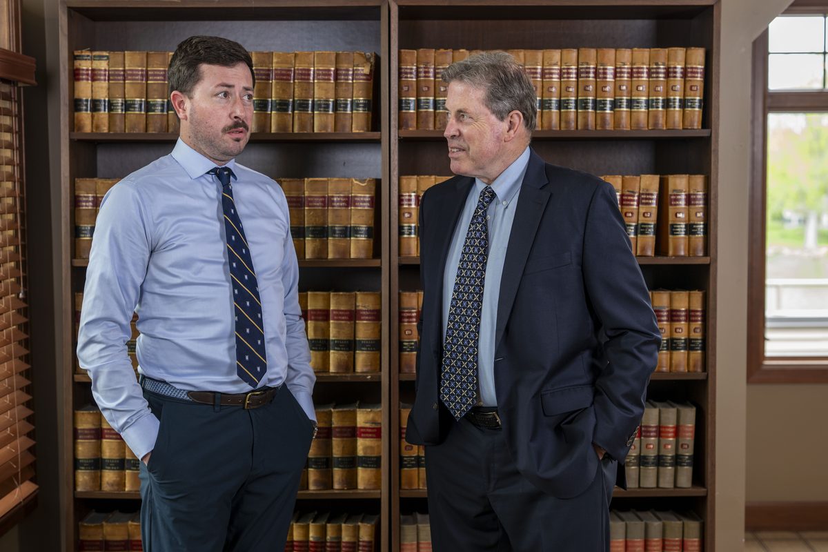 Charles and Robert Gross at the office